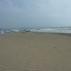 Photos de grande plage de sable fin en arribant sur Orbetello