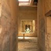 Photos couloir dans une maison de Pompei donnant sur le patio central